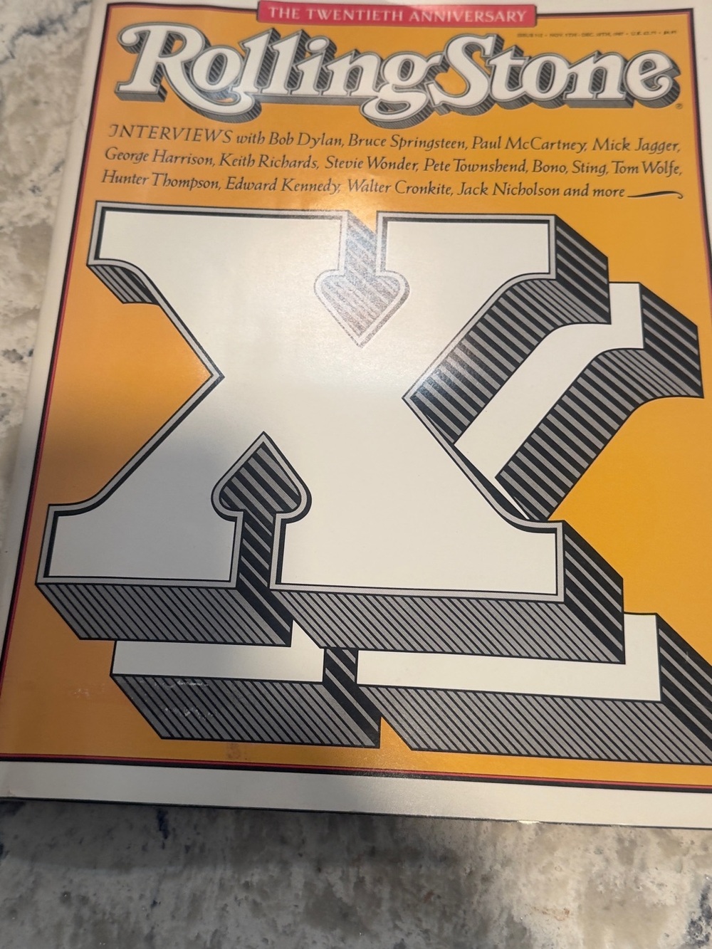 the Rolling Stones Cover Art Coffee Table Book – Yellow and White Graphic
